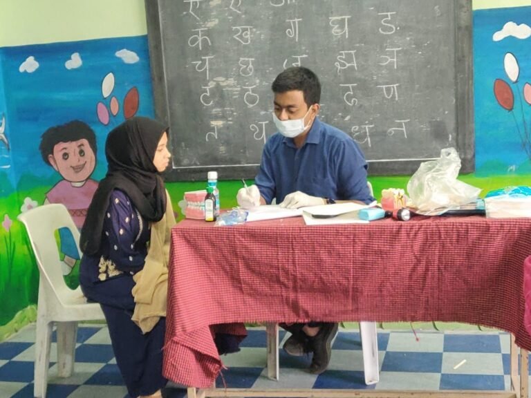 Dr G Amar Prasad conducting Free Dental Camp at Rosedale School, for Brace Dental Clinic