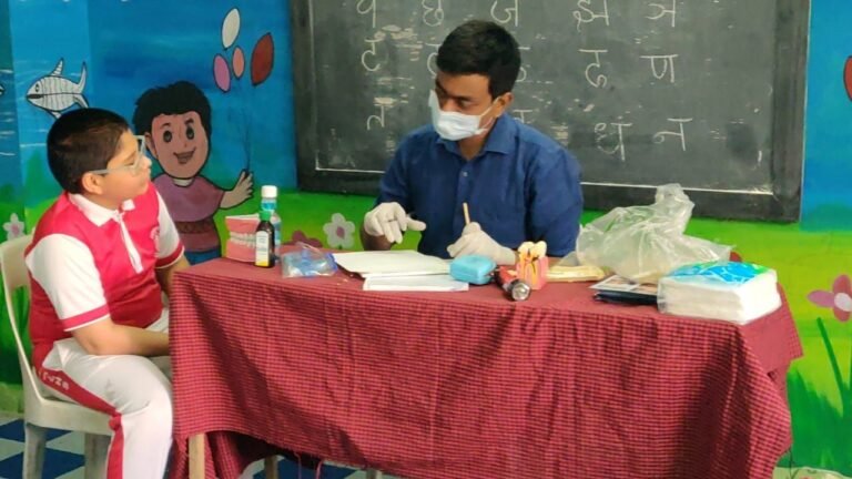 Dr G Amar Prasad conducting Free Dental Camp at Rosedale School, for Brace Dental Clinic