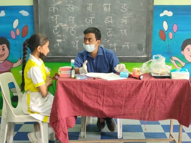 Dr G Amar Prasad conducting Free Dental Camp at Rosedale School, for Brace Dental Clinic