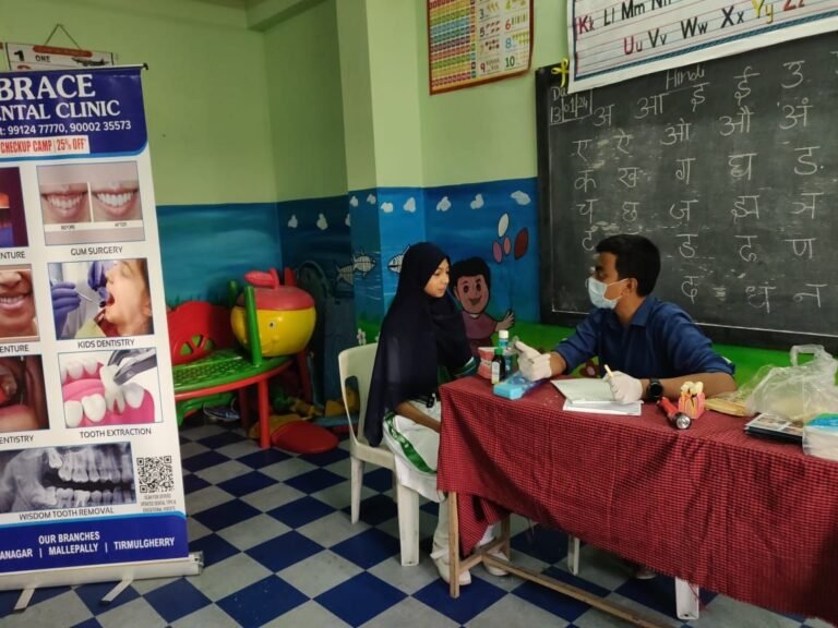 Dr G Amar Prasad conducting Free Dental Camp at Rosedale School, for Brace Dental Clinic